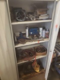 Cabinet with tools, sockets and old ladle