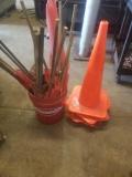 4 safety and bucket of red safty flags