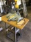 Dewalt DW705 12 inch compound miter saw on stand with casters