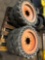 Set of 4 solid 8 lug Bobcat Tires