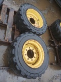 Two 8 Lug skid loader tires