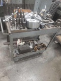 Tool cart loaded with collets, chuck, and tooling