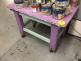 Wooden table on casters