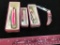 Lot of 4 Pink Rough Rider Knives in original boxes