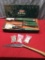 Coleman Grill Kit, Matchbooks, and folding camp saw