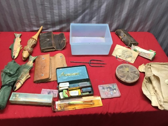 Collection of vintage fishing lures, wooden fish and more