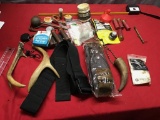 Deer Antlers, paper wrapped shells, and other various firearm related items