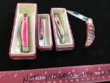 Lot of 4 Pink Rough Rider Knives in original boxes