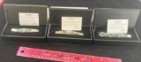 3- Remington Commemorative knives on boxes