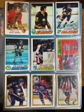 Huge book of Hockey cards, the older ones are pictured. There are loads of 70's cards in this book