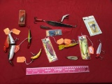 Collection of modern and vintage fishing lures, some in package