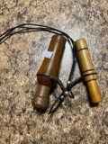 2 duck calls, one is marked Faulk's