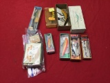Collection of better lures, rapalas in Original box, flat fish lures, and hooks in original box