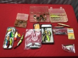 Collection of vintage and modern fishing lures, rooster tails and more