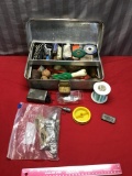 Vintage fishing box, with line, bobbers, corks and more