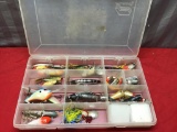 Plastic organizer with assorted fishing lures