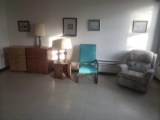 Recliner, dressers, nightstand, lamp, and pictures