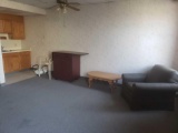 Nice chair, coffee table, rolling cabinet, potty chairs, cabinetry