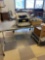 Stainless rolling cart with fax machine and kitchen supply