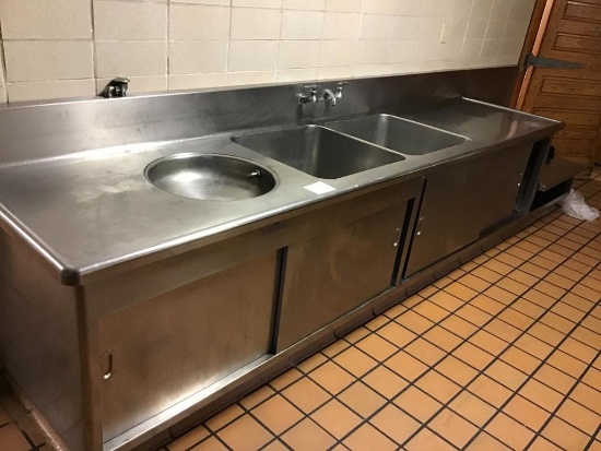 Built in Stainless Steel dish washing unit, w/ under storage, food disposal, and built in sink