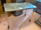 Stainless steel table on casters