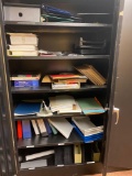 Metal cabinet with office supply