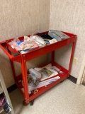 Red service maintenance cart with contents