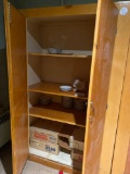 Wooden storage cabinet and contents