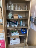 Metal supply cabinet with contents