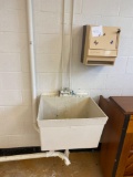 Slop sink with paper towel dispenser