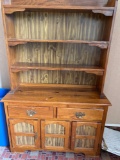 Wooden cabinet with dish display