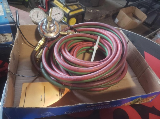Oxygen and acetylene torch hoses and harris gauge