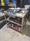 Shop cart on casters loaded with tooling eyelets and more