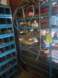 9 tier shelf loaded with tooling lamp ballasts, wire and more