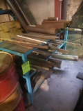 Solid 3 tier 5ft x 2 ft shelf loaded w/ heavy solid cylinder shaped steel and scrap