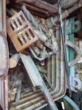 Steel tote loaded with large bits, blocks and chucks