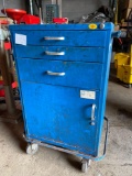 Metal rolling tool cart with assorted contents