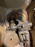 Vintage vice with assorted grinder wheels