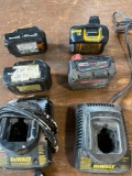 Lot of assorted batteries and chargers.