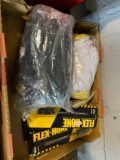 Flat load of assorted gloves and hones