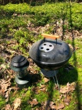 Weber charcoal grill and camping lantern