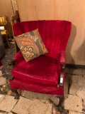 Wingback red velvet chair on claw and ball foot