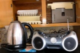 Aroma Hot Water Kettle, Radio, Serving Tray & Contents of Cabinet above Refrigerator