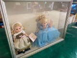 Framed pair of Cinderella & Poor Cinderella Madame Alexander Dolls