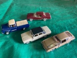 (4) smaller die cast cars. 1 is ERTL advertising