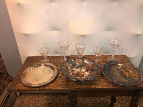 Lot of several pieces of china, crystal glasses and silver plated platters....