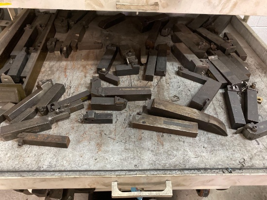 Shelf load of assorted tooling