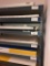 Contents of Industrial Shelf of Various Colors and Sizes of Paper