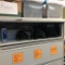 Shelf of office supplies