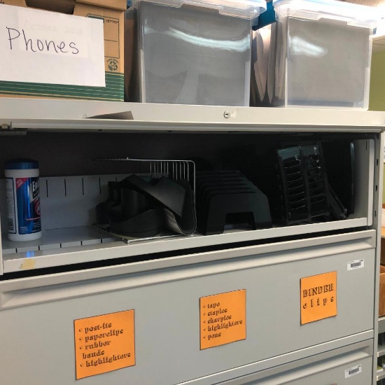 Shelf of office supplies